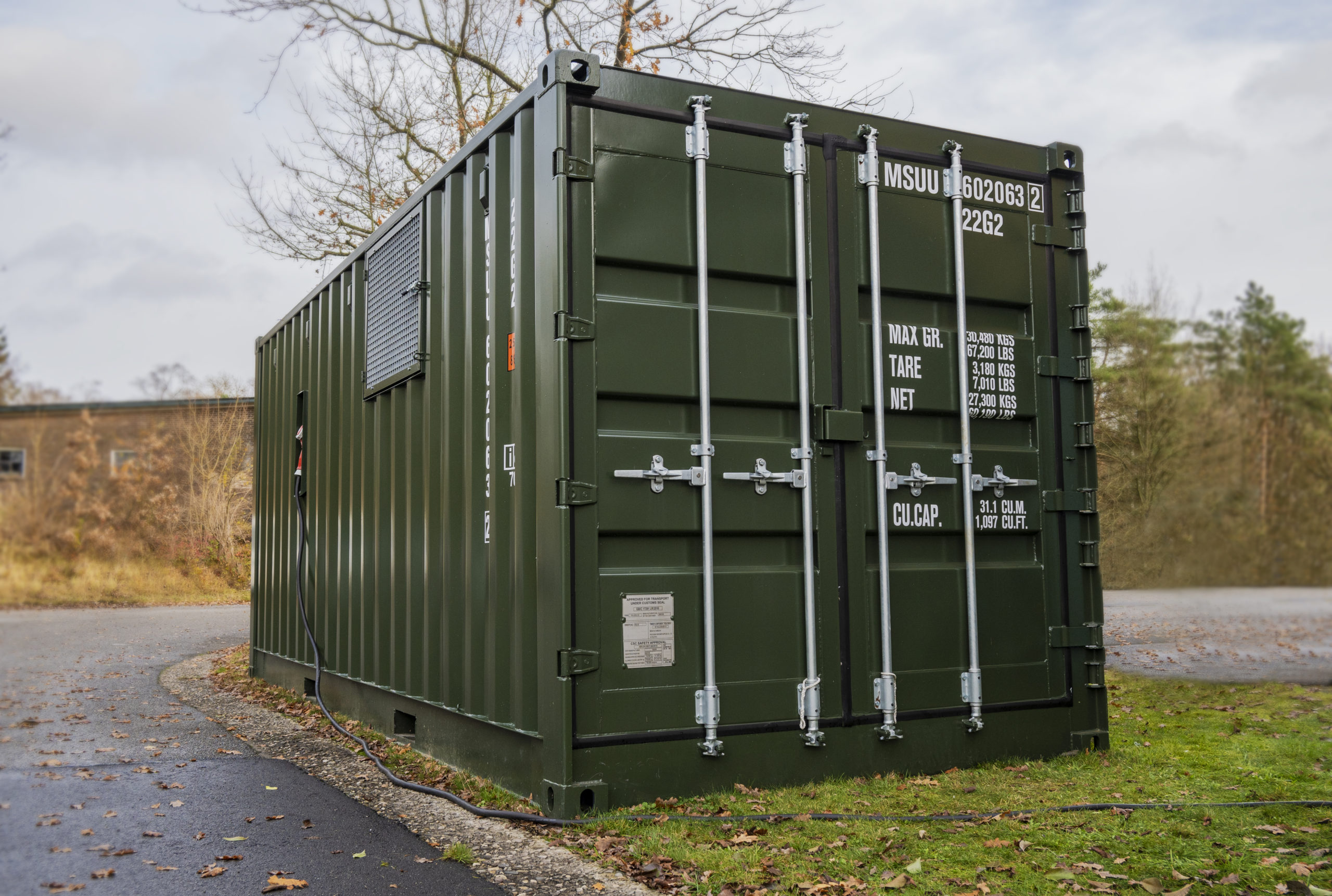 shipping container for additive manufacturing machine