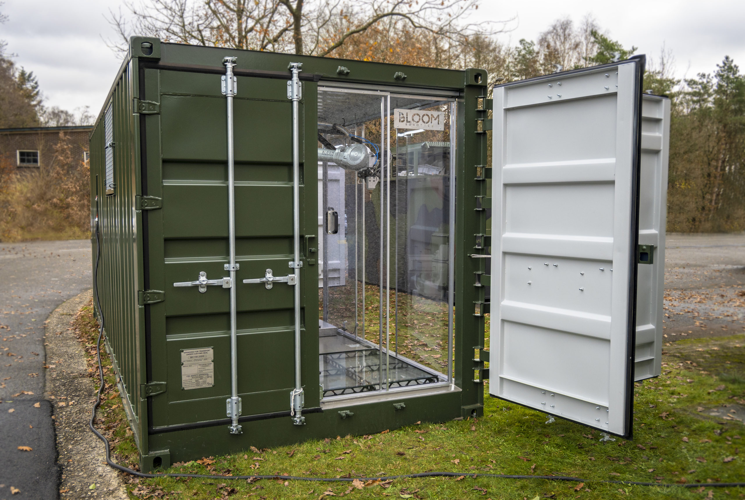 Shipping container with 3d-printer inside